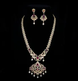 Captivating Peacock Long Zircon Necklace set with Ruby red and white CZ stones