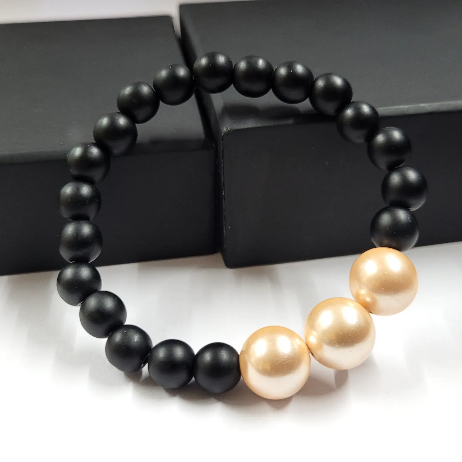 Cream Shell Pearls 12mm Bracelet With 8mm Black Beads